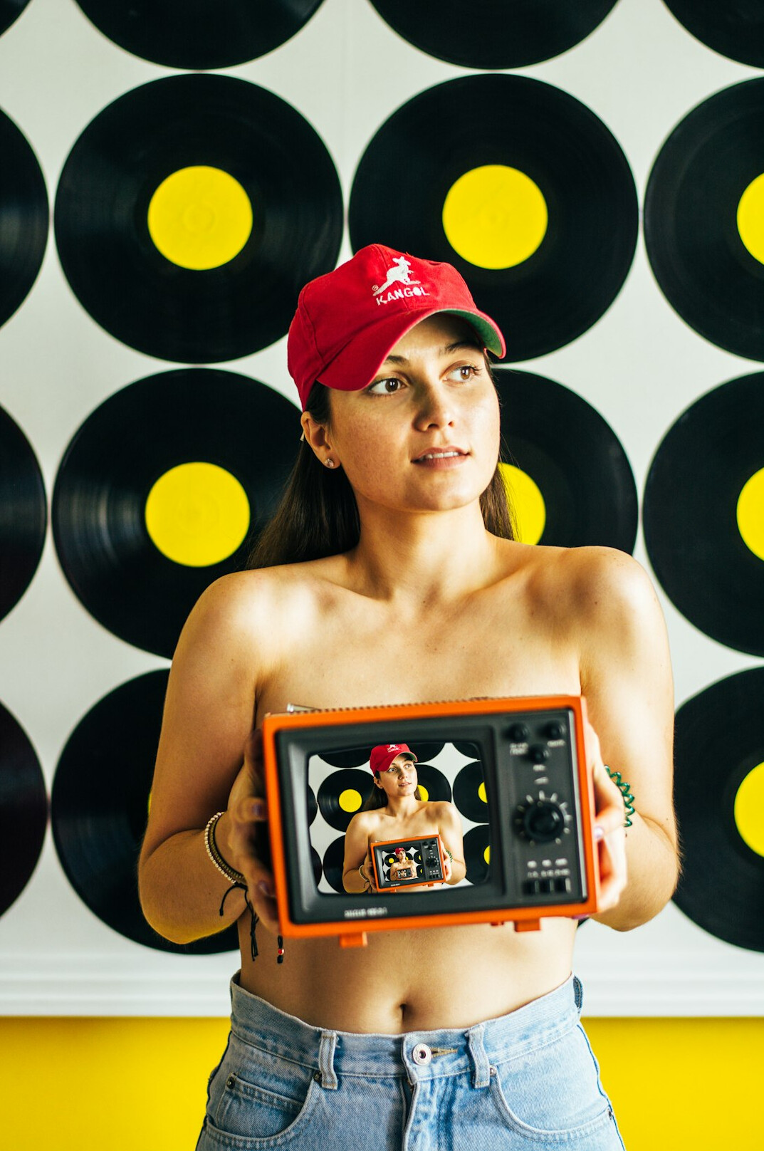 Portrait of a Turkish woman sound engineer with headphones around her neck